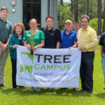 East GA State College Moon Tree Crew with Tree Campus Sign